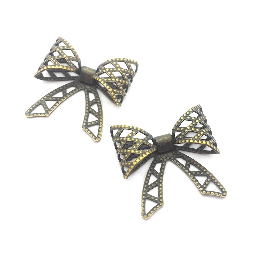 Ciondoli a Forma di Fiocco in  - Jewelry Making Store recensione e prezzo